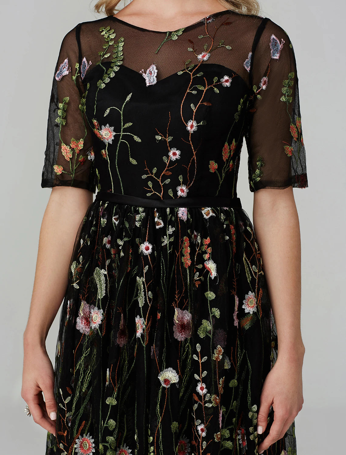 Elegant A-Line tea length party dress with illusion neck and half sleeves.