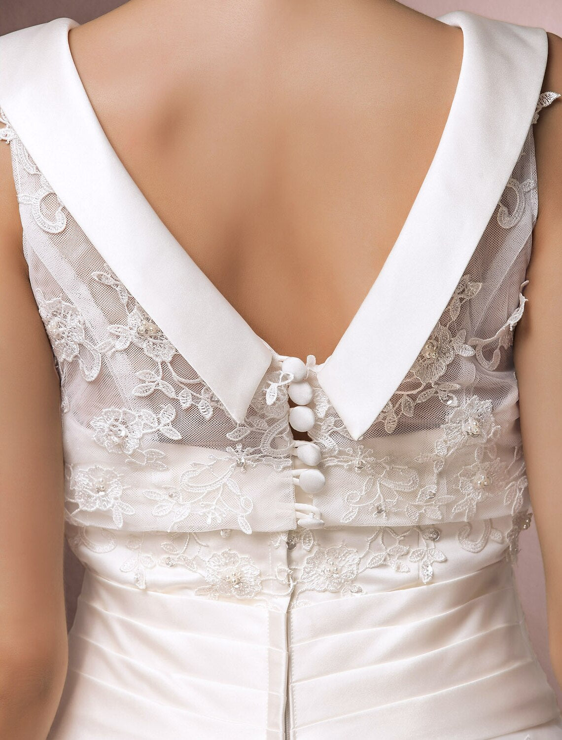 Full length view of the A-line wedding dress, emphasizing its tea length and flow.