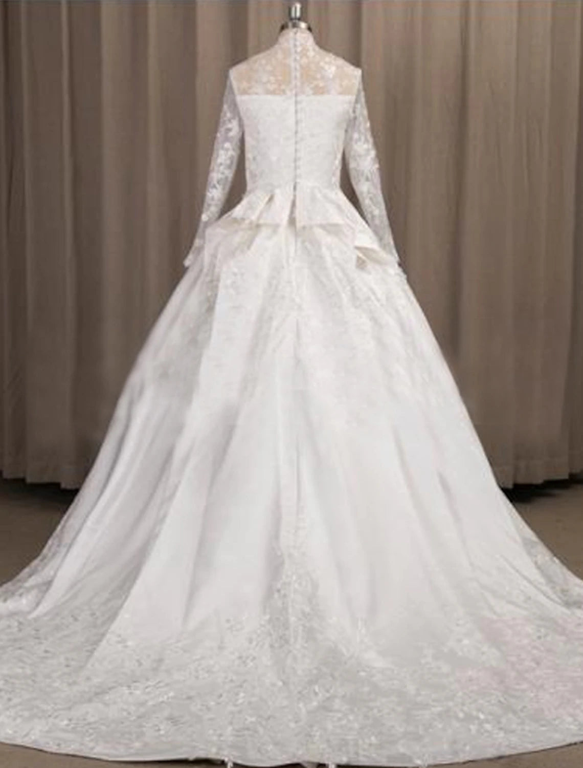Back view of A-Line wedding dress showing court train and pleats.