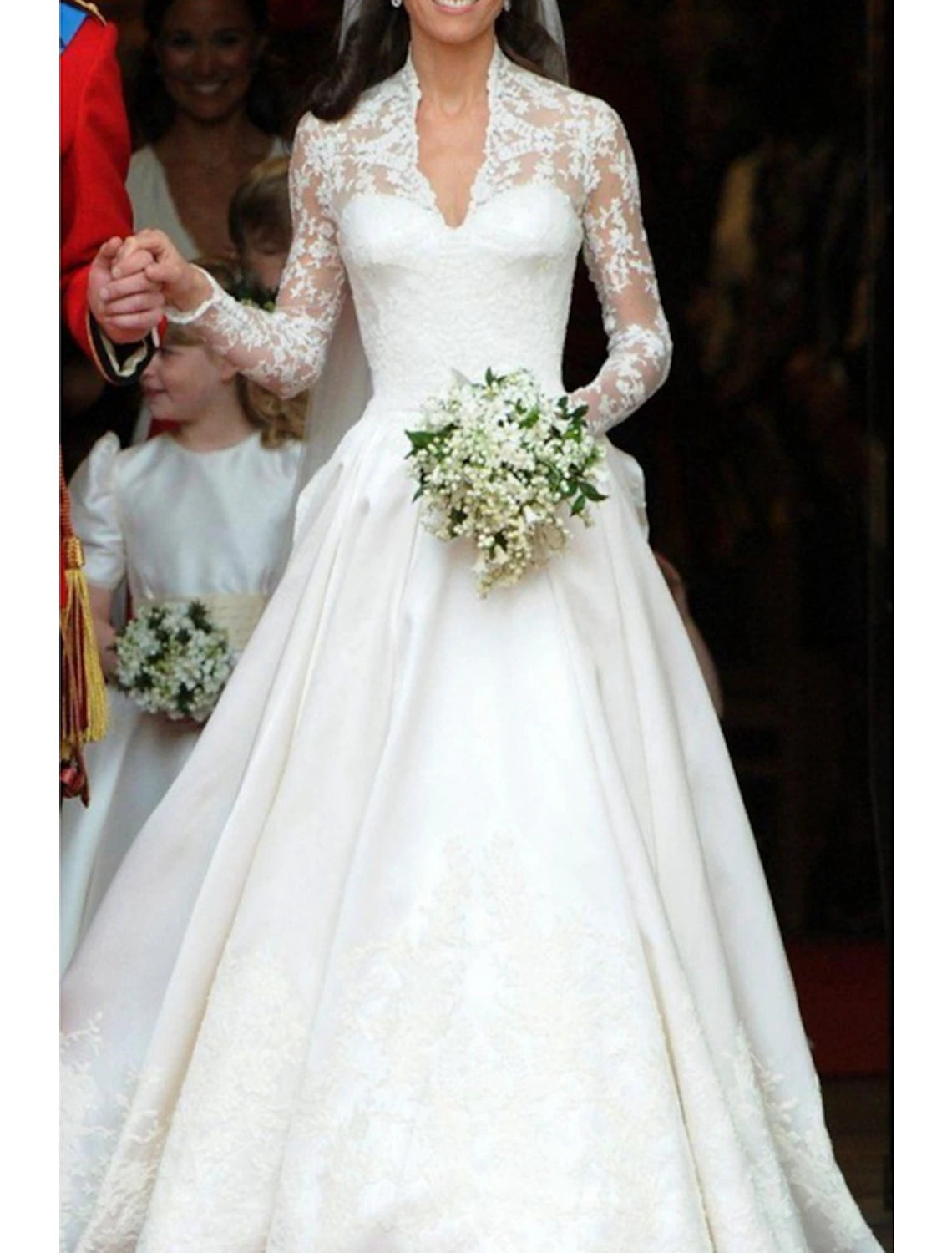 Side profile of formal satin wedding dress with long sleeves.