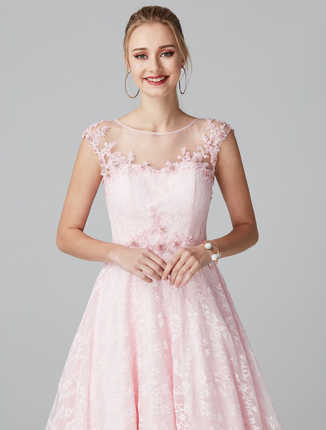 Detail of the illusion neckline and short sleeve lace.