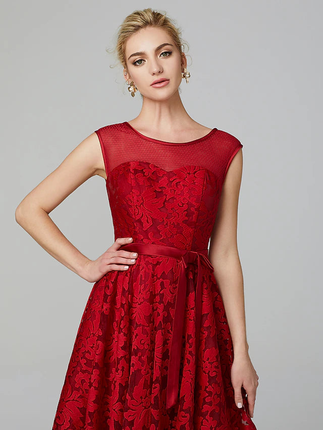 Woman posing in the elegant A-line dress, showcasing its silhouette.