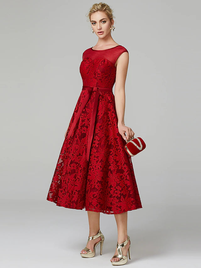 Another angle of the floral lace tea length dress, suitable for parties.