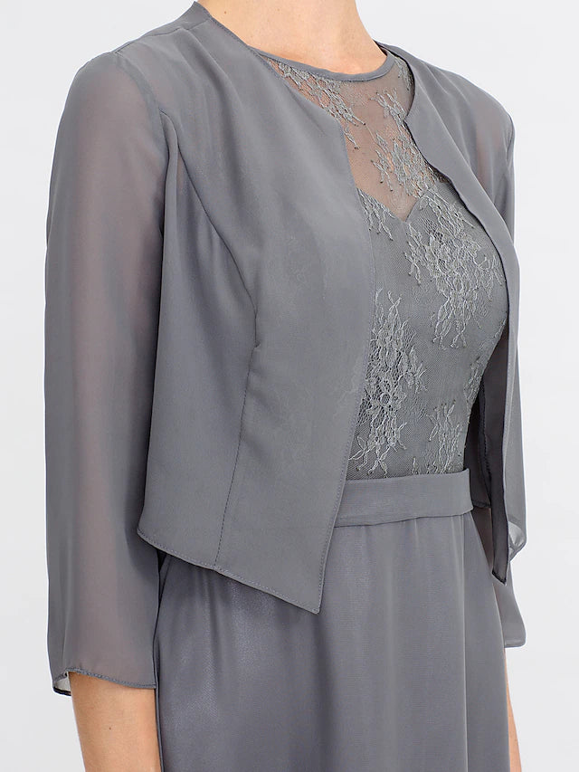 Woman smiling in the A-line mother of the bride dress, showing its comfortable fit.