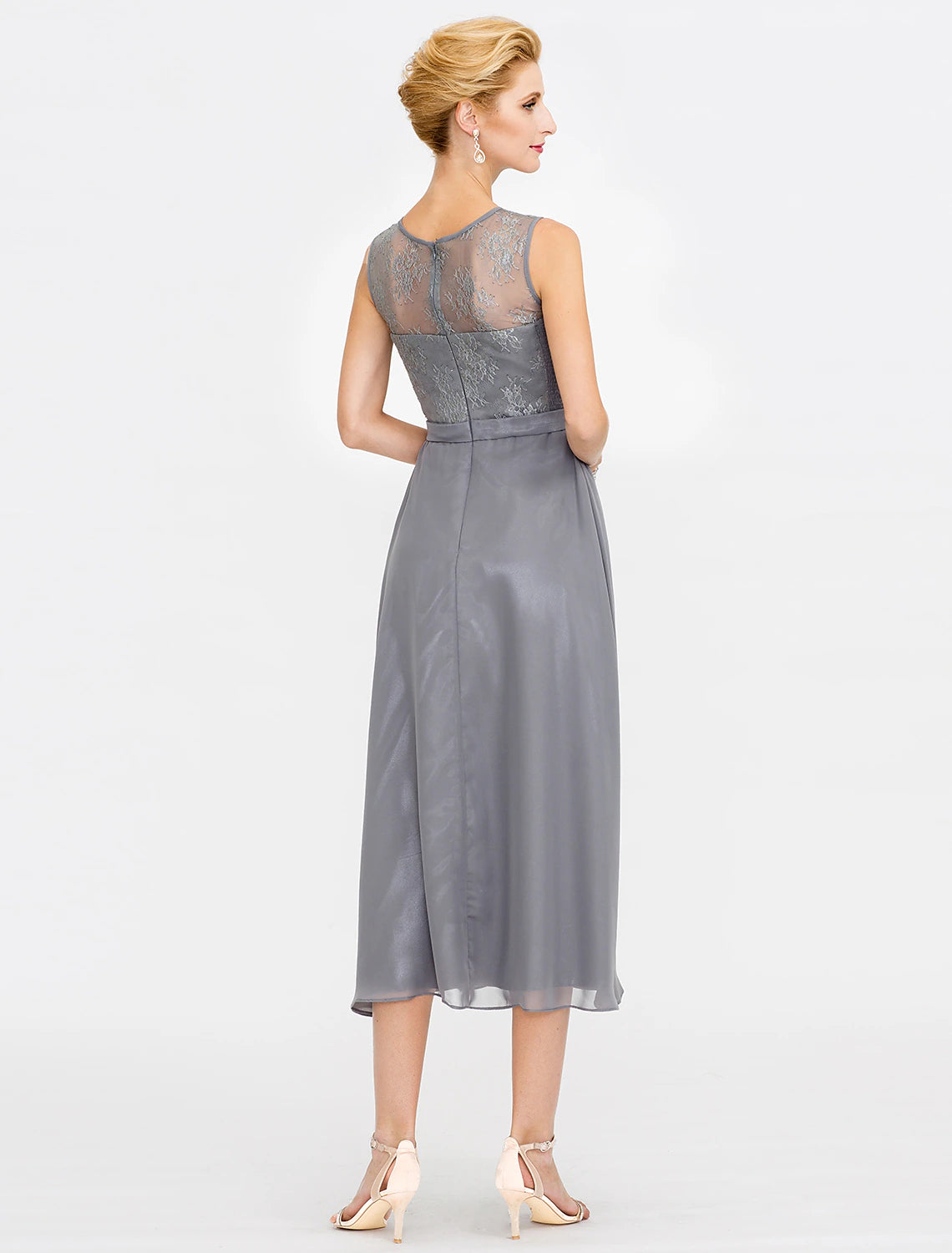 Close-up of the illusion neckline and delicate corded lace on the dress.