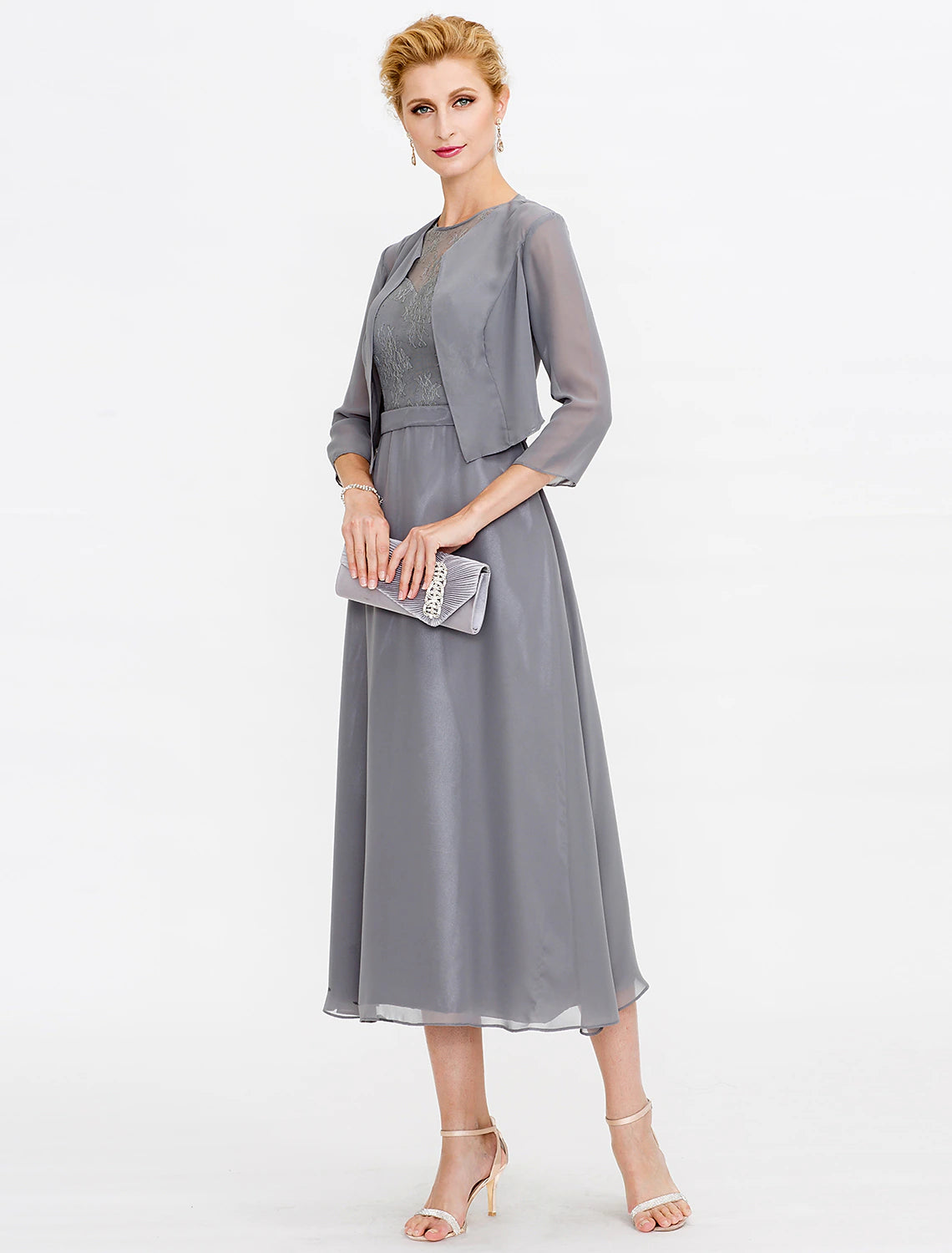 Full length view of the elegant tea length dress, suitable for fall weddings.