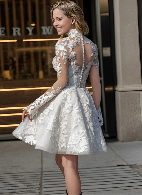 Back view of the A-line lace wedding gown with long sleeves.