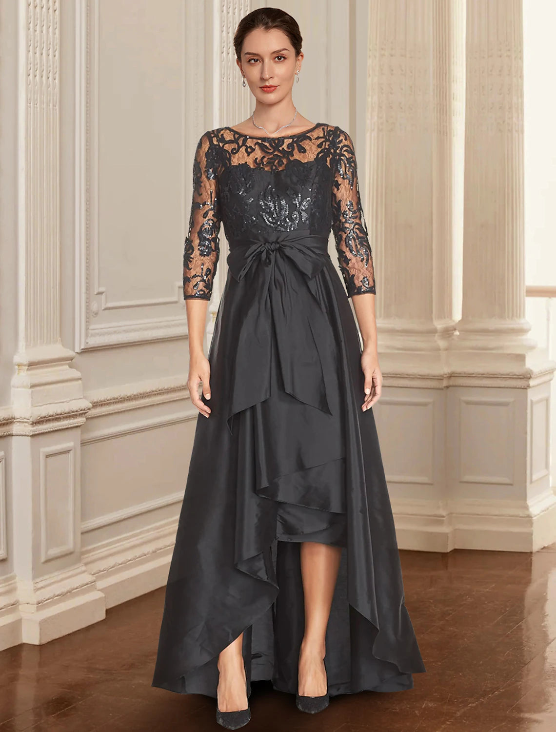 Elegant A-line black dress with jewel neck, 3/4 sleeves, lace, and sequin details.