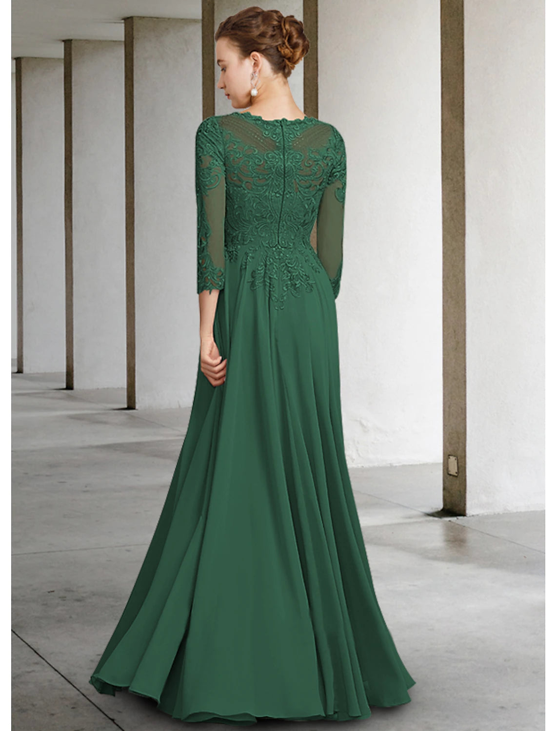 Close-up of delicate lace and applique details on the A-Line gown.