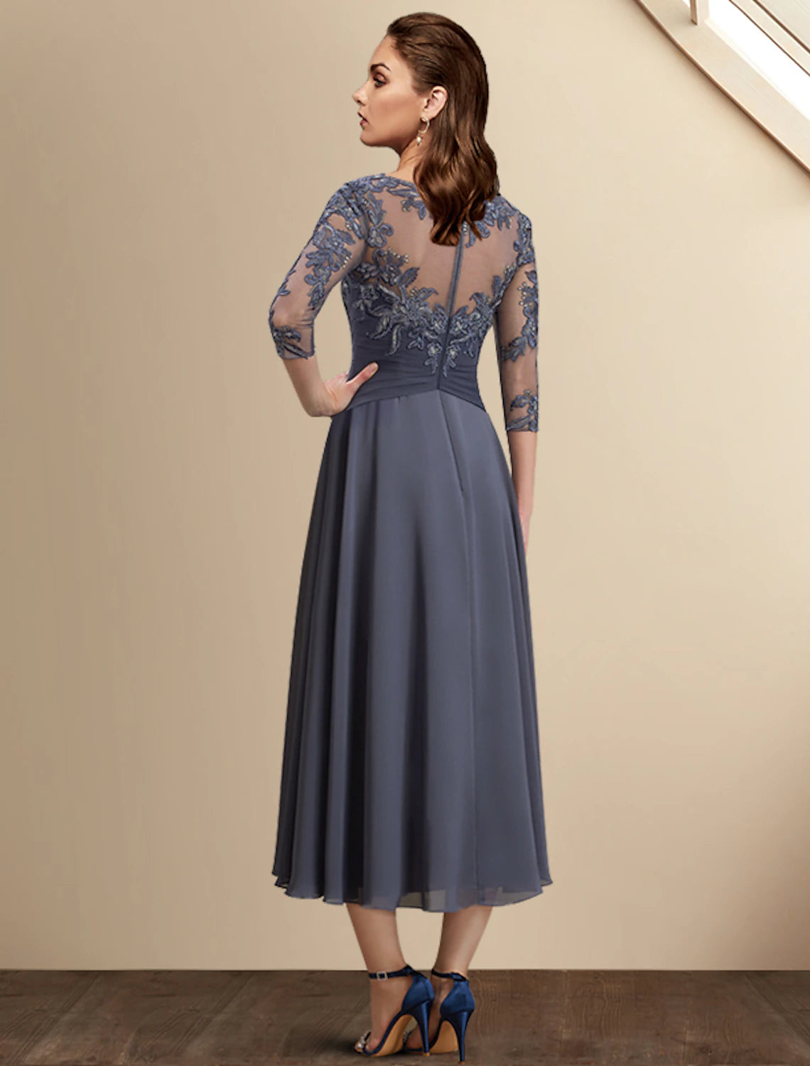 Back view of the A-Line Mother of the Bride dress, showcasing sequin appliques and asymmetrical design.