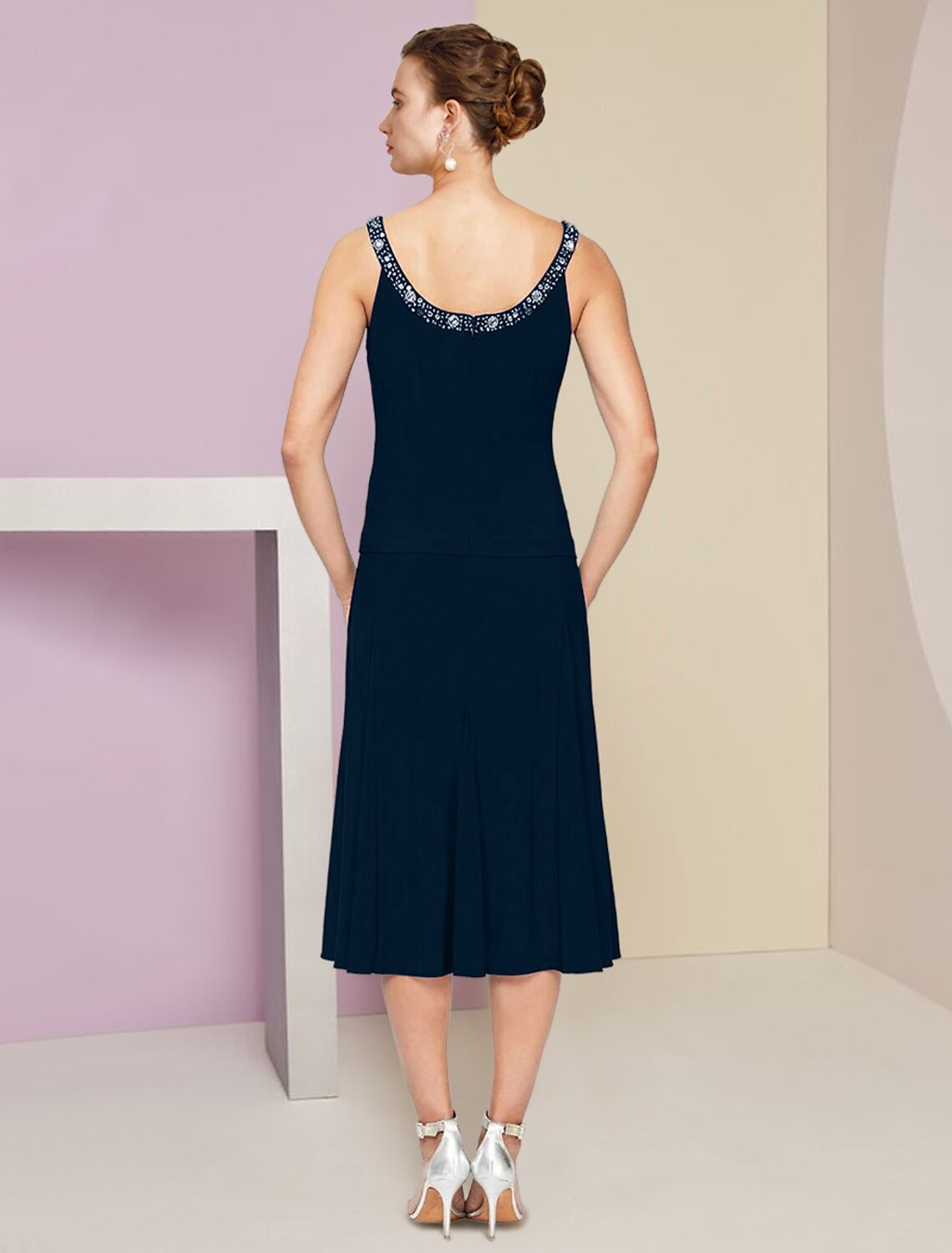 Back view of the elegant A-line dress, showing the smooth silhouette.