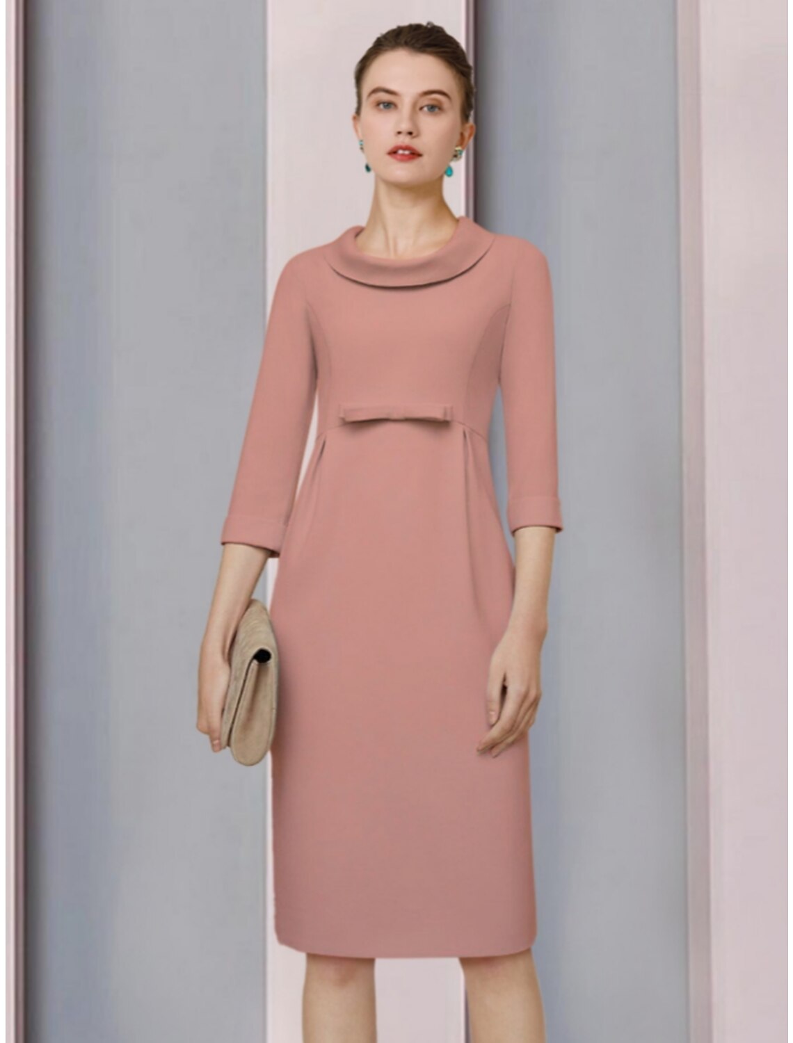 Woman in a satin A-line formal dress featuring ruching and bow details.