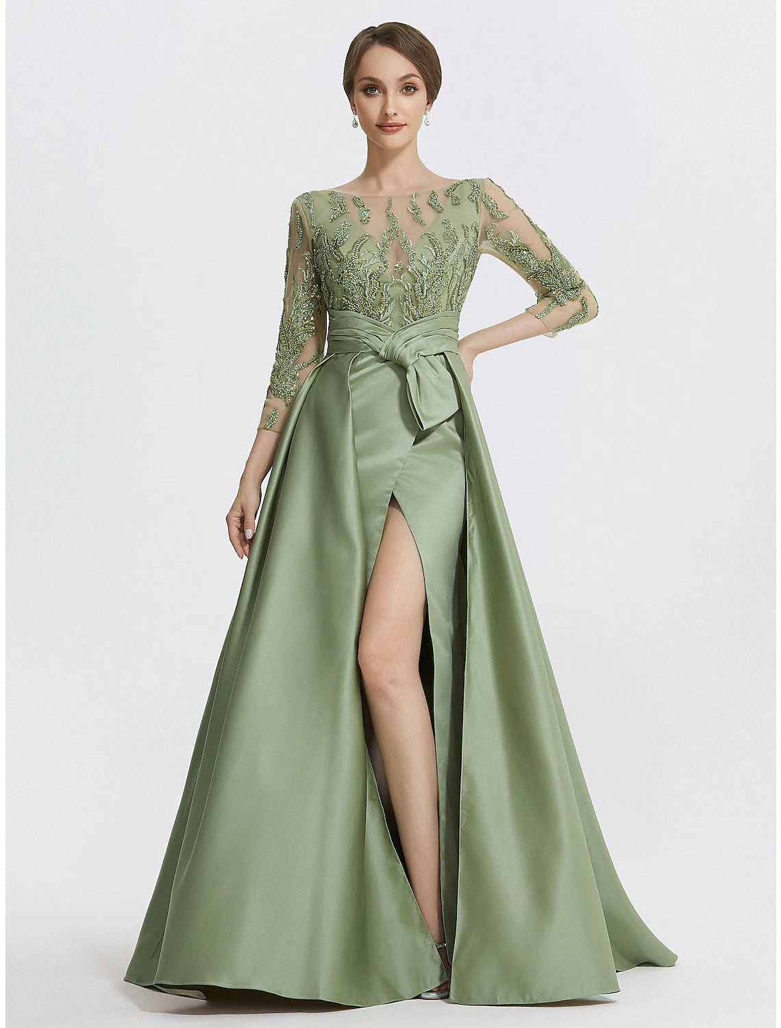 Model posing in the formal A-line satin gown, showing its elegant drape.