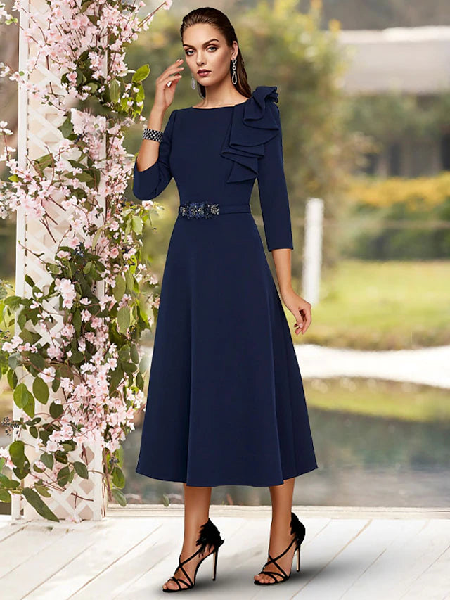 Elegant A-line Mother of the Bride dress with jewel neck and 3/4 sleeves.