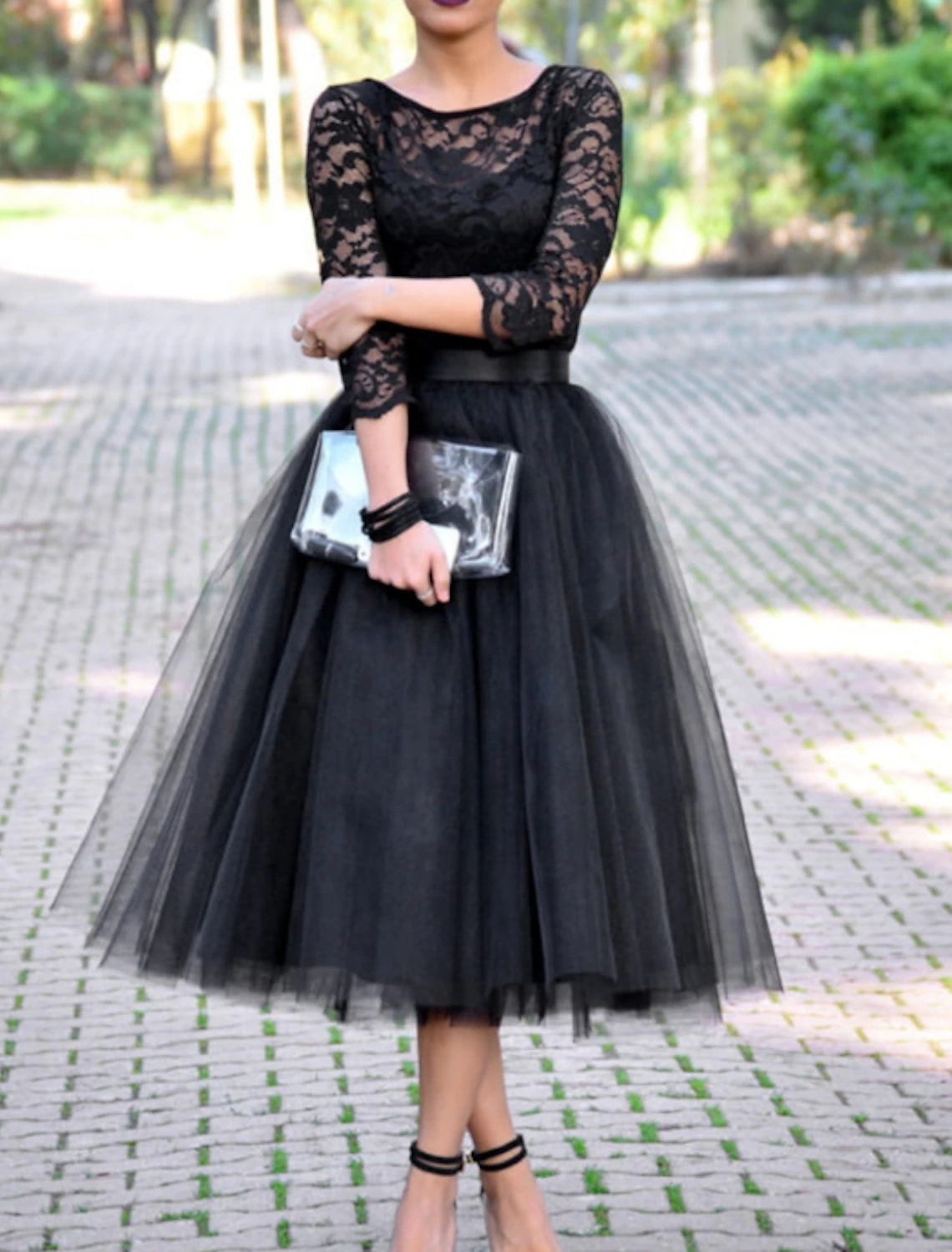 Full length view of the black tulle and lace cocktail dress.