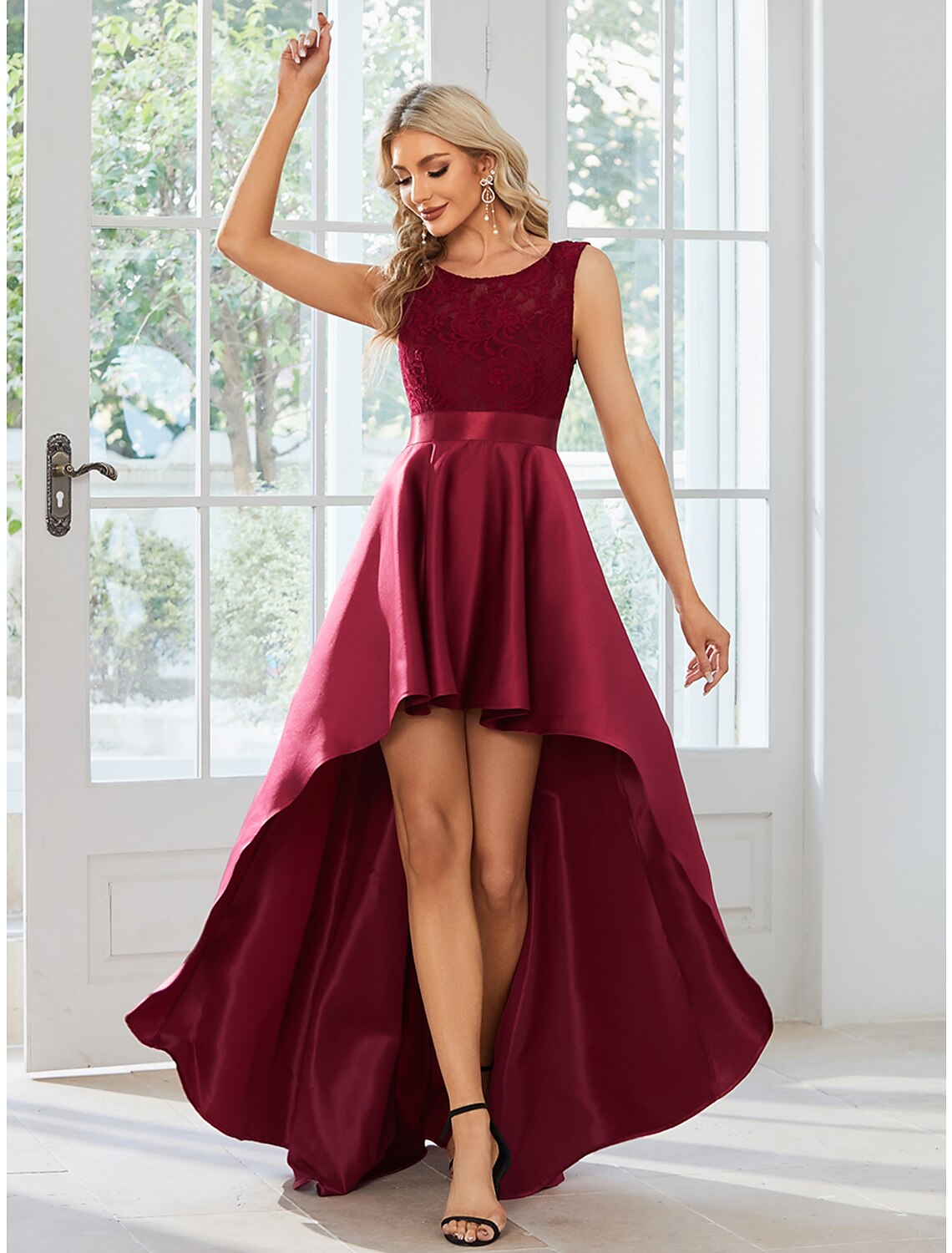 Side view of the A-line satin dress, highlighting the asymmetrical hem.