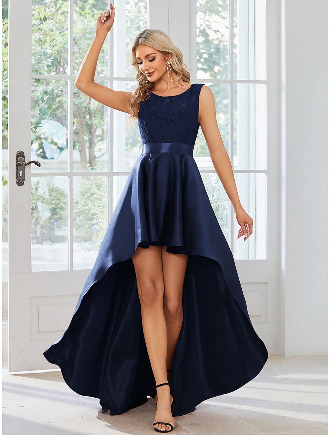 Model walking in the A-line satin dress, demonstrating its flow.