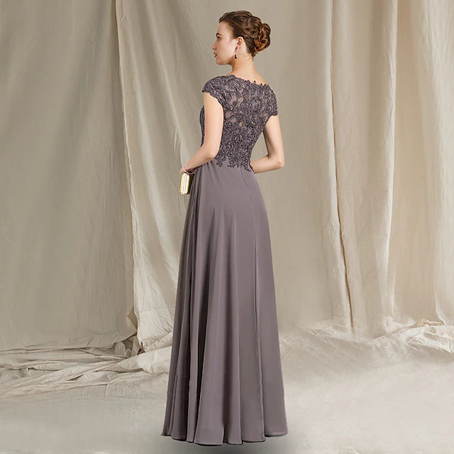 Floor-length chiffon lace dress featuring pleats and appliques.