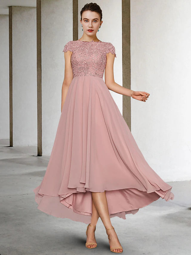 Elegant A-Line Mother of the Bride dress with jewel neck, cap sleeves, and high-low tea length hem.