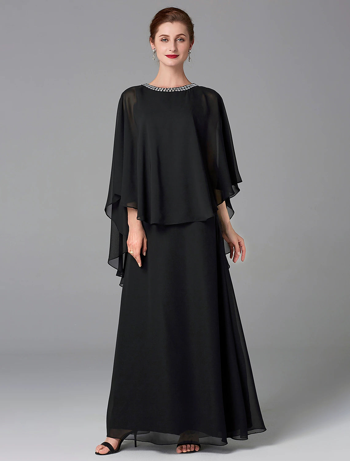 Full length view of the A-line dress, emphasizing its formal appeal.