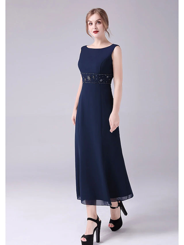 Detail of the flowing chiffon fabric and A-line silhouette.