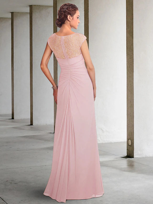 Floor-length chiffon Mother of the Bride gown featuring pleats and a sleeveless design.