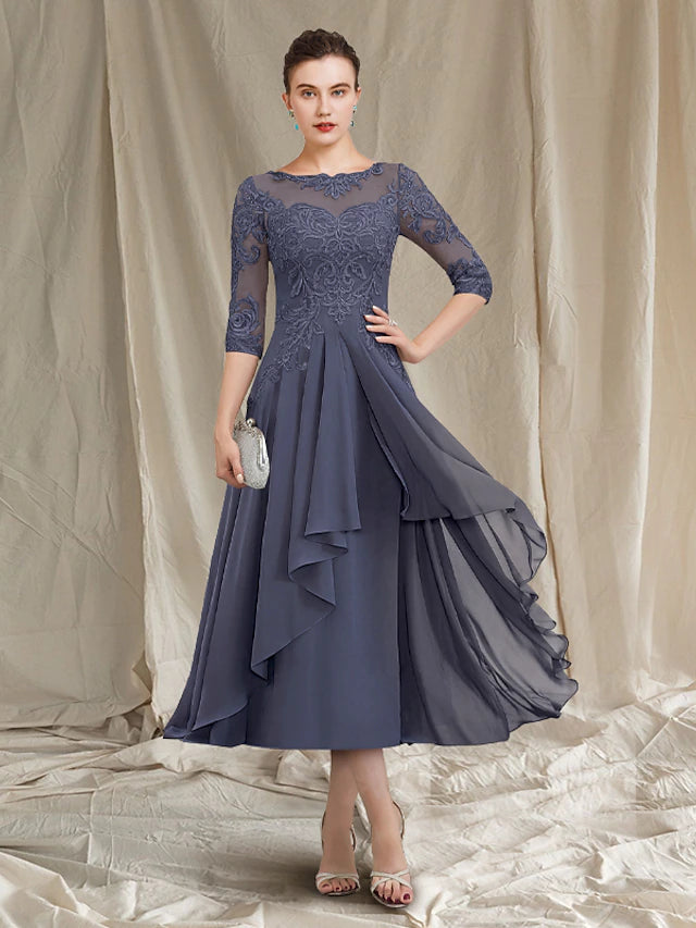 Elegant A-line Mother of the Bride dress with jewel neck, tea length, chiffon lace, and 3/4 sleeves.