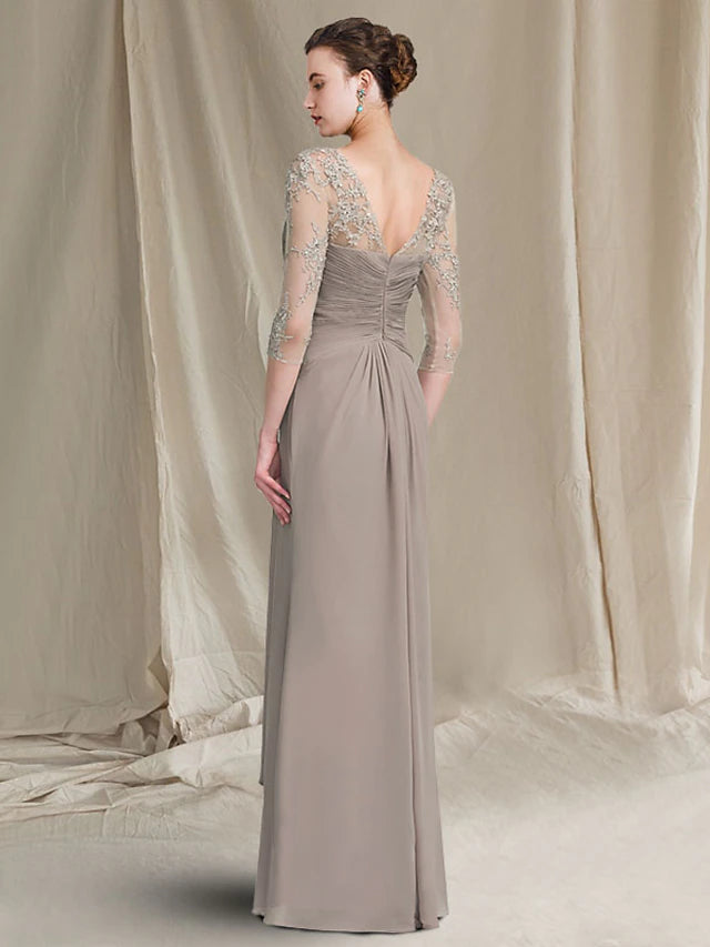 Close-up of ruched appliques and lace detail on the elegant formal dress.