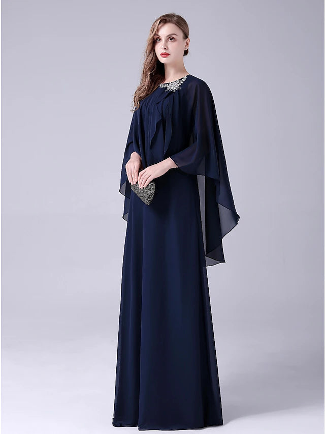 Back view of the floor-length chiffon gown with graceful draping.