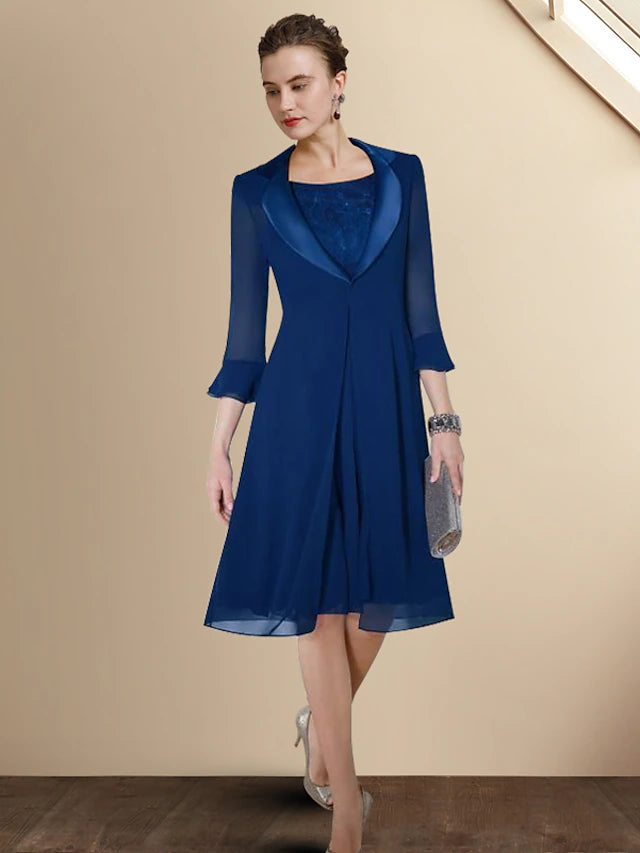 Front view of an elegant A-line chiffon Mother of the Bride dress with a jewel neck and short sleeve jacket.