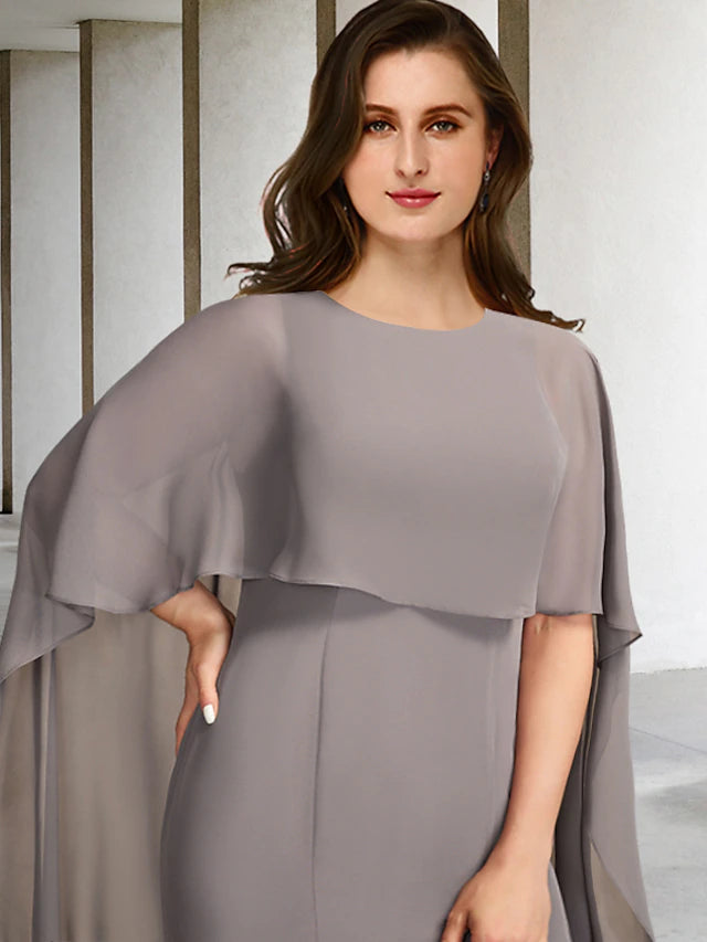 Back view of a formal plus size chiffon gown with sweep train.
