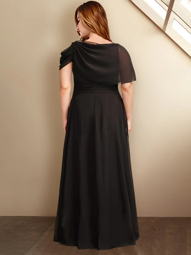 Side view of a flowing chiffon Mother of the Bride gown with a jewel neckline.
