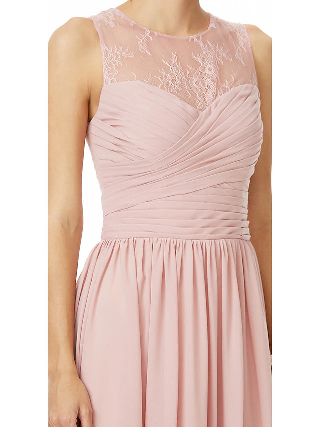 Close-up of the lace and chiffon fabric on the bridesmaid dress.