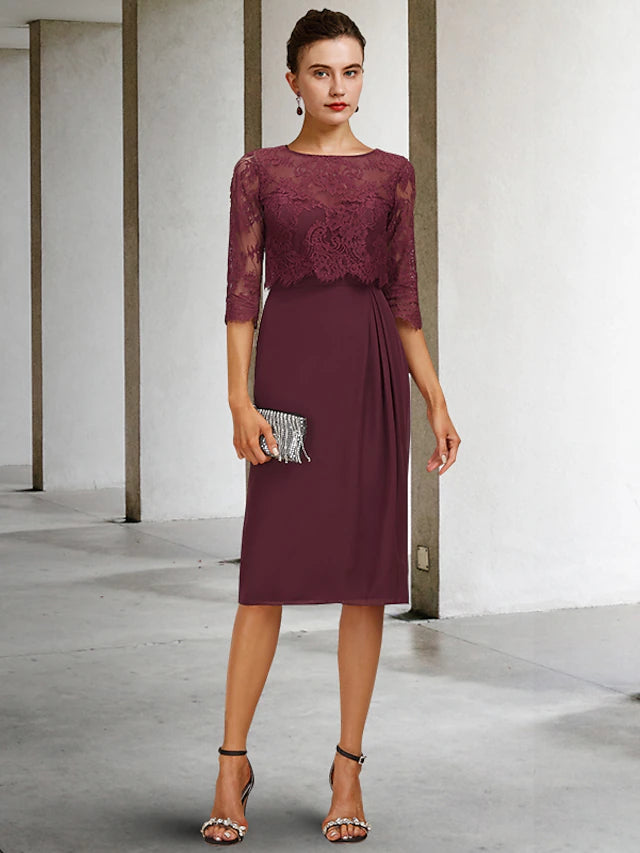 Elegant A-Line Mother of the Bride dress with jewel neck and half sleeves, made of chiffon and lace.