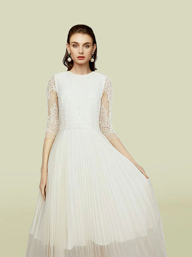 Back view of the Mother of the Bride gown, highlighting the elegant silhouette.