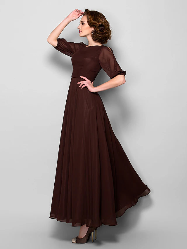 Side view of elegant A-line Mother of the Bride gown with half sleeves.