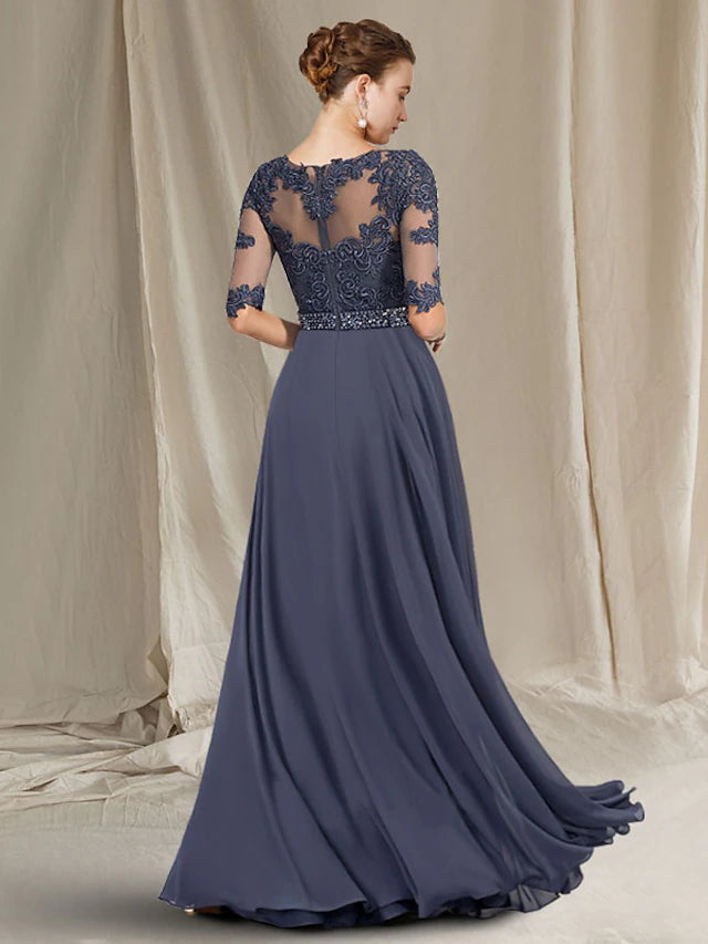 Back view of a luxurious A-Line gown with lace and tulle details.