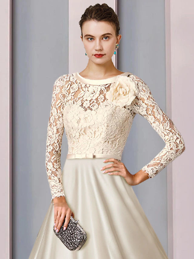 Back view of the A-Line dress showing pleats and bow details.