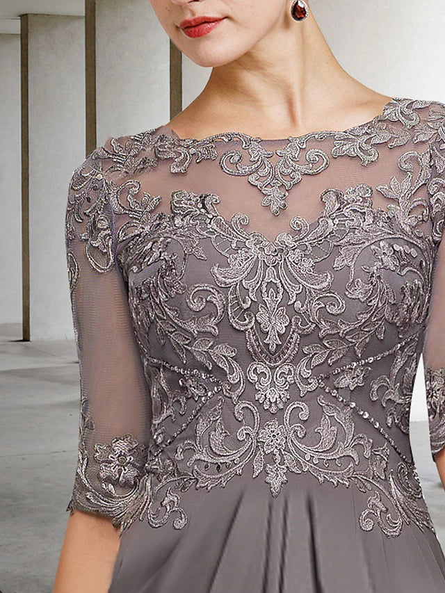 Back view of the plus size chiffon lace gown with pleats.