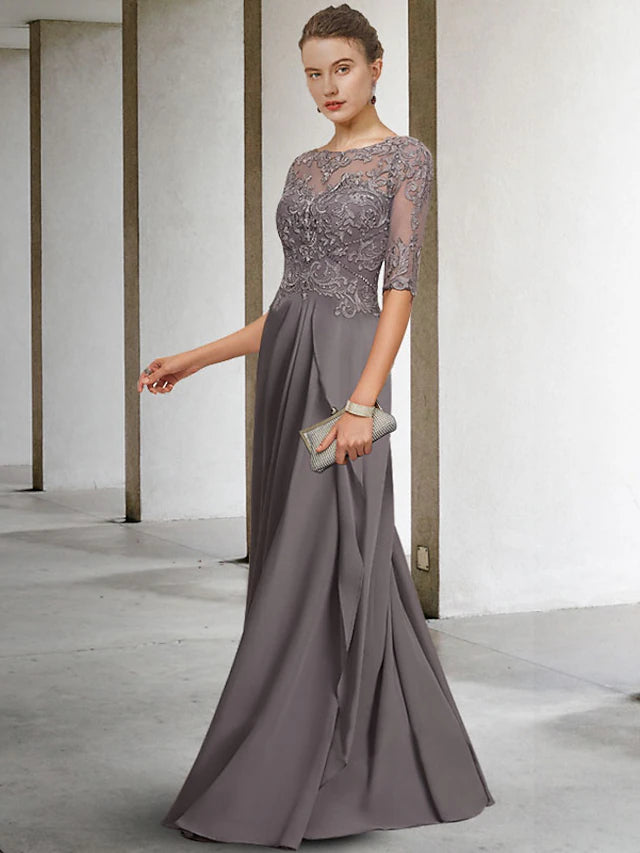 Side view of the floor-length formal dress featuring beading and appliques.
