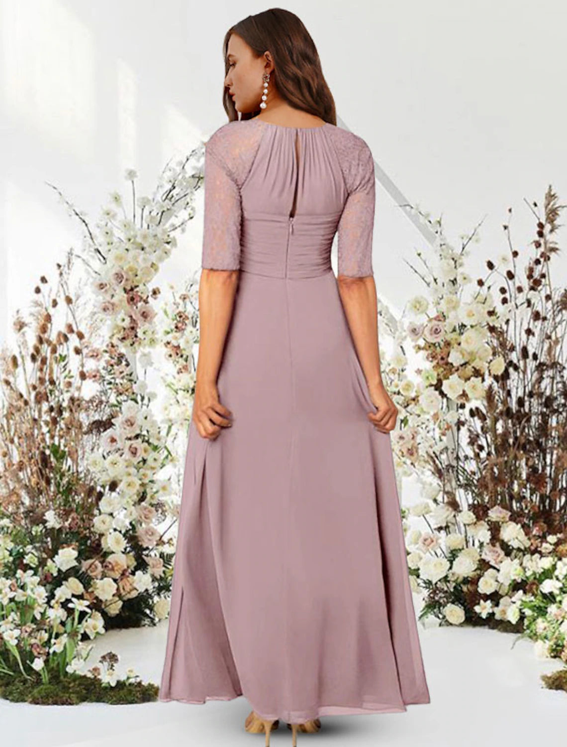 Back view of A-Line chiffon gown showing pleats and floor length.