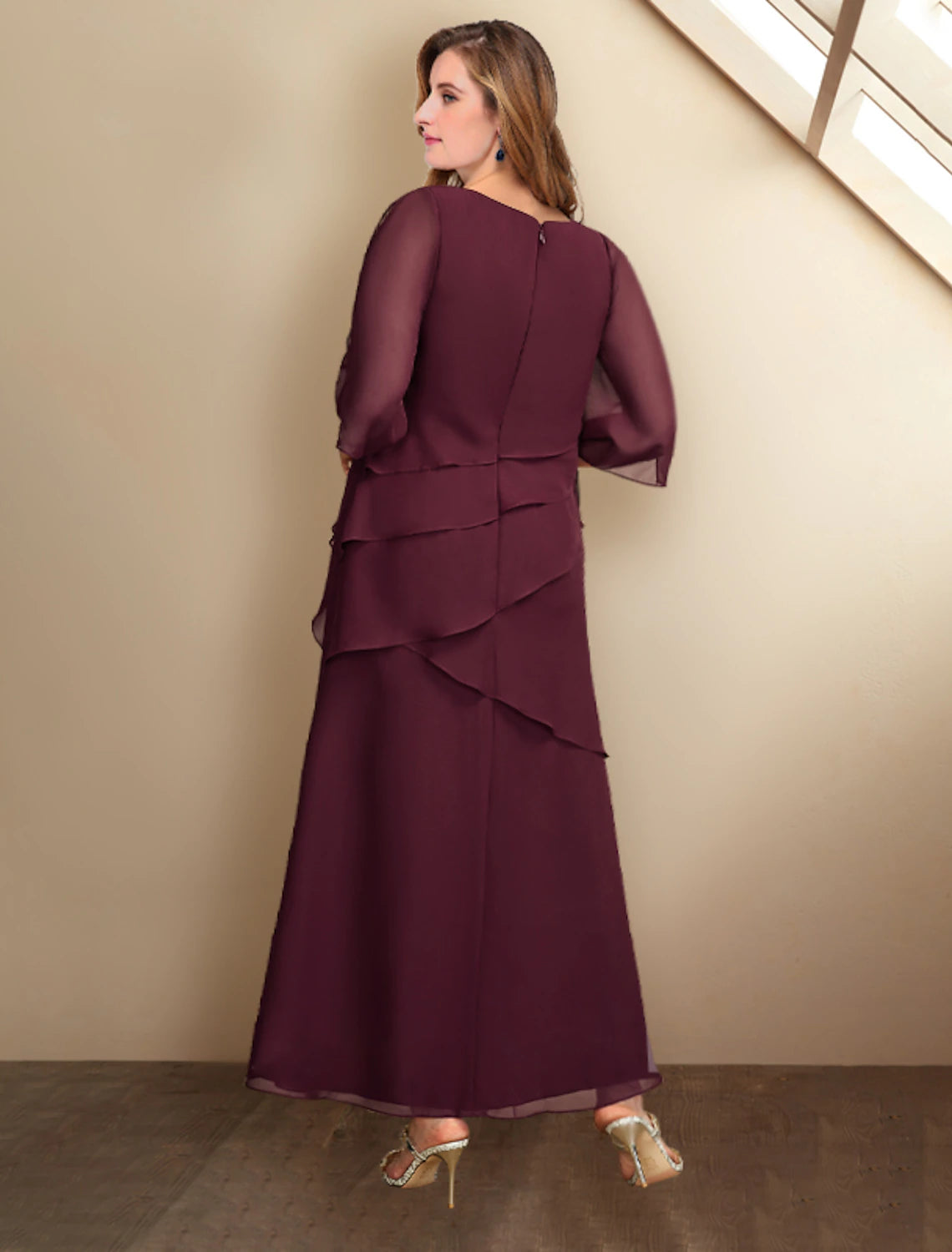 Side view of the plus size formal chiffon dress with ruffles.