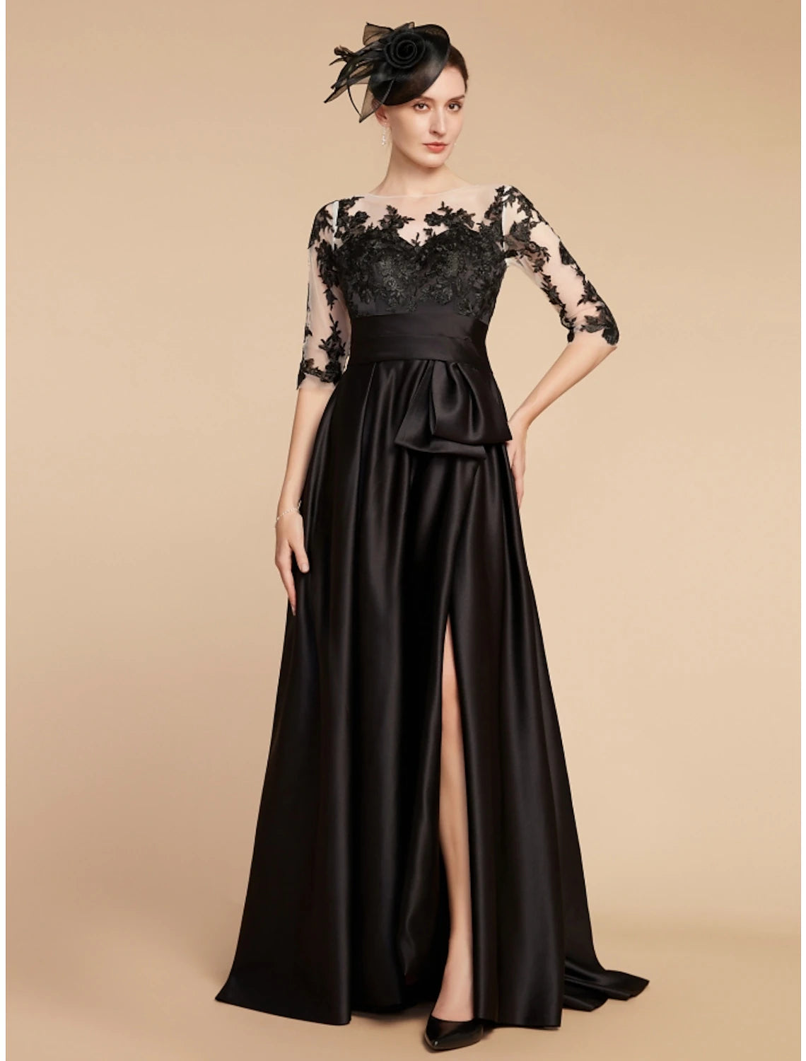 Elegant A-line Mother of the Bride dress with jewel neck and half sleeves.