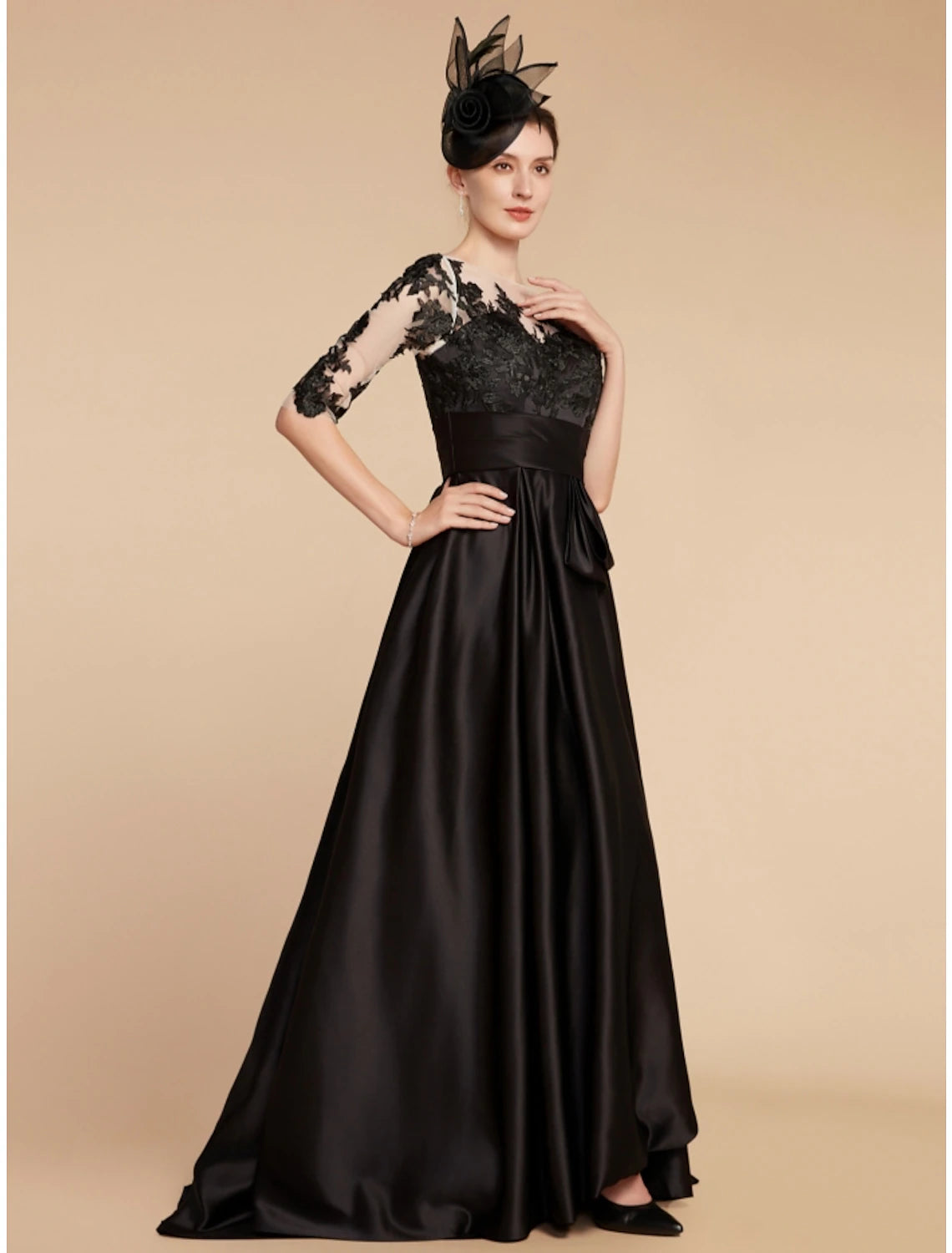 Side view of the Mother of the Bride dress showing ruching and split front.