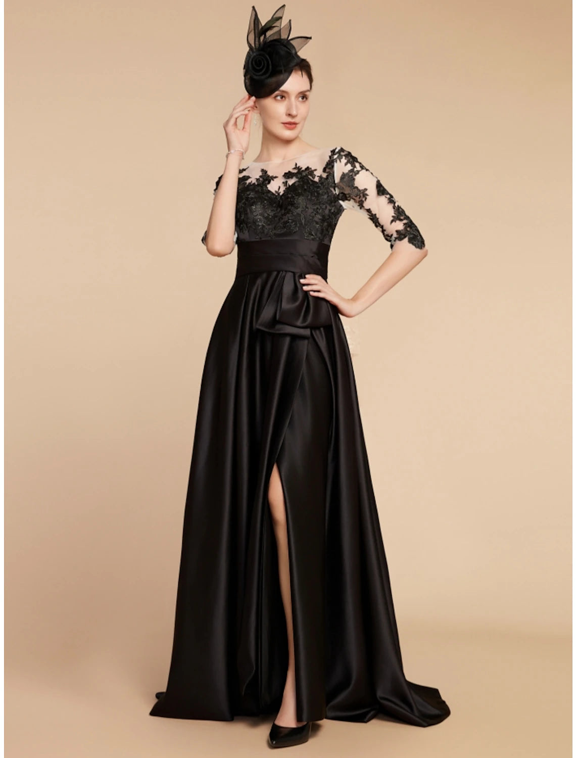 Close-up of the satin and lace fabric detail on the half sleeve dress.