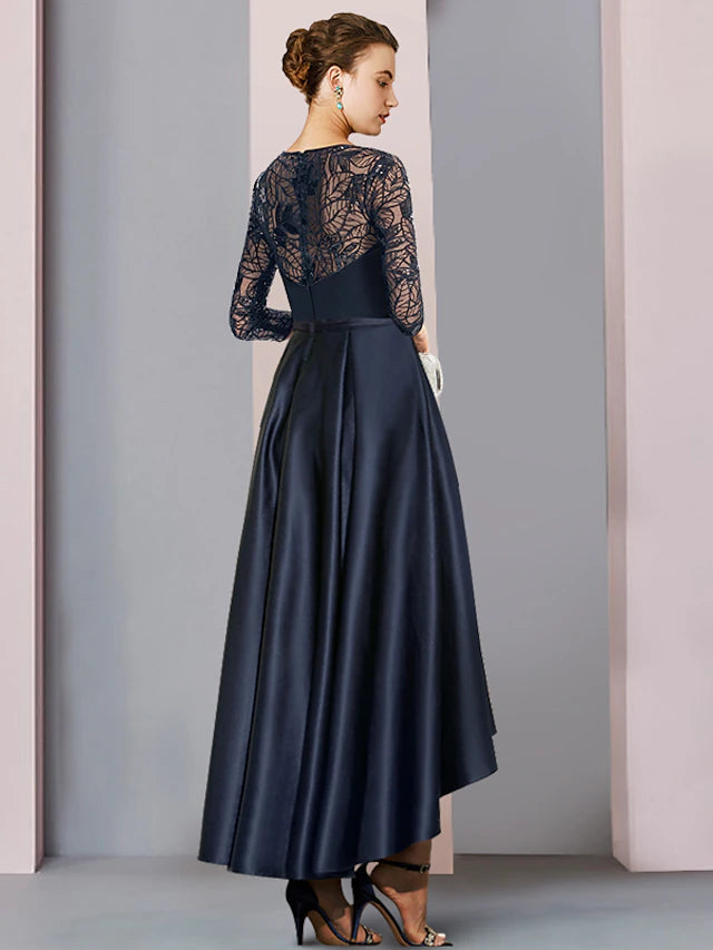 Close-up of the sequined lace bodice and jewel neckline of the formal gown.