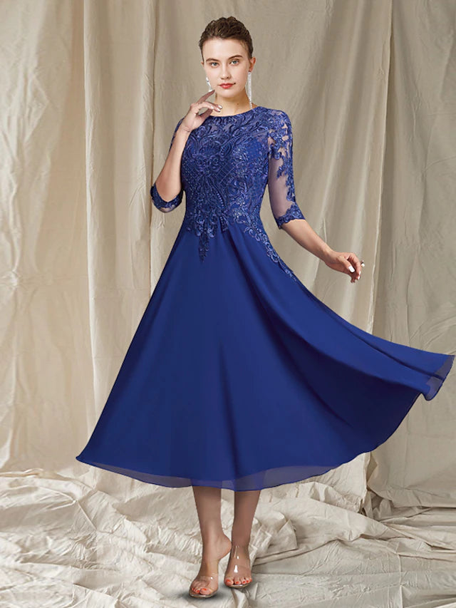 Elegant A-line Mother of the Bride gown with jewel neck and half sleeves.