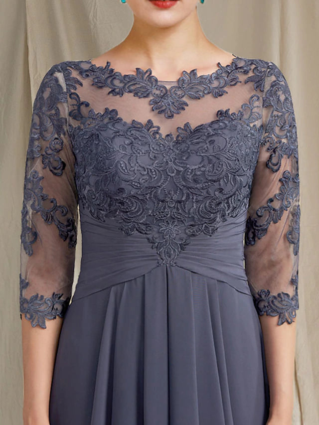 Back view of the asymmetrical Mother of the Bride gown with ruched appliques.