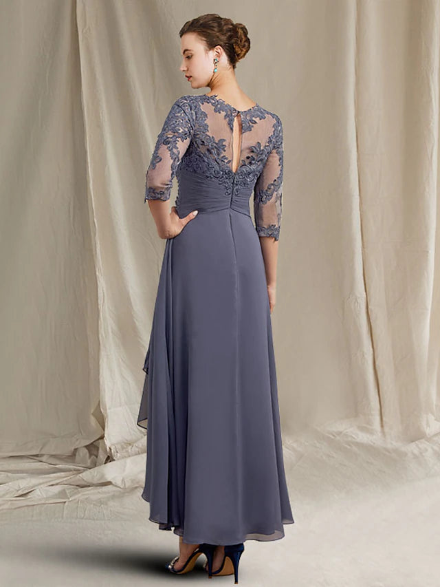 Close-up of the chiffon lace fabric and ruched appliques on the dress.