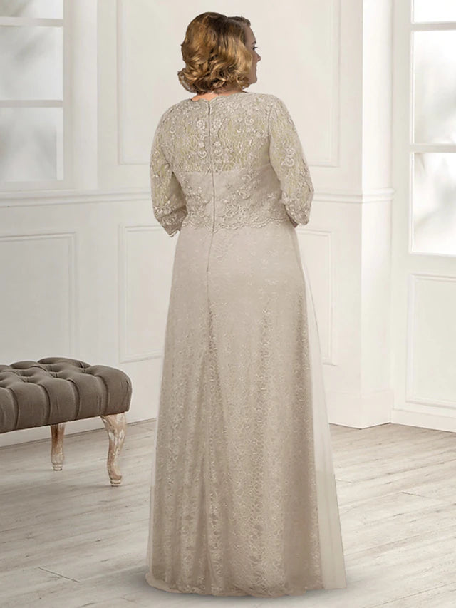 Elegant floor-length lace gown for Mother of the Bride, featuring intricate appliques.